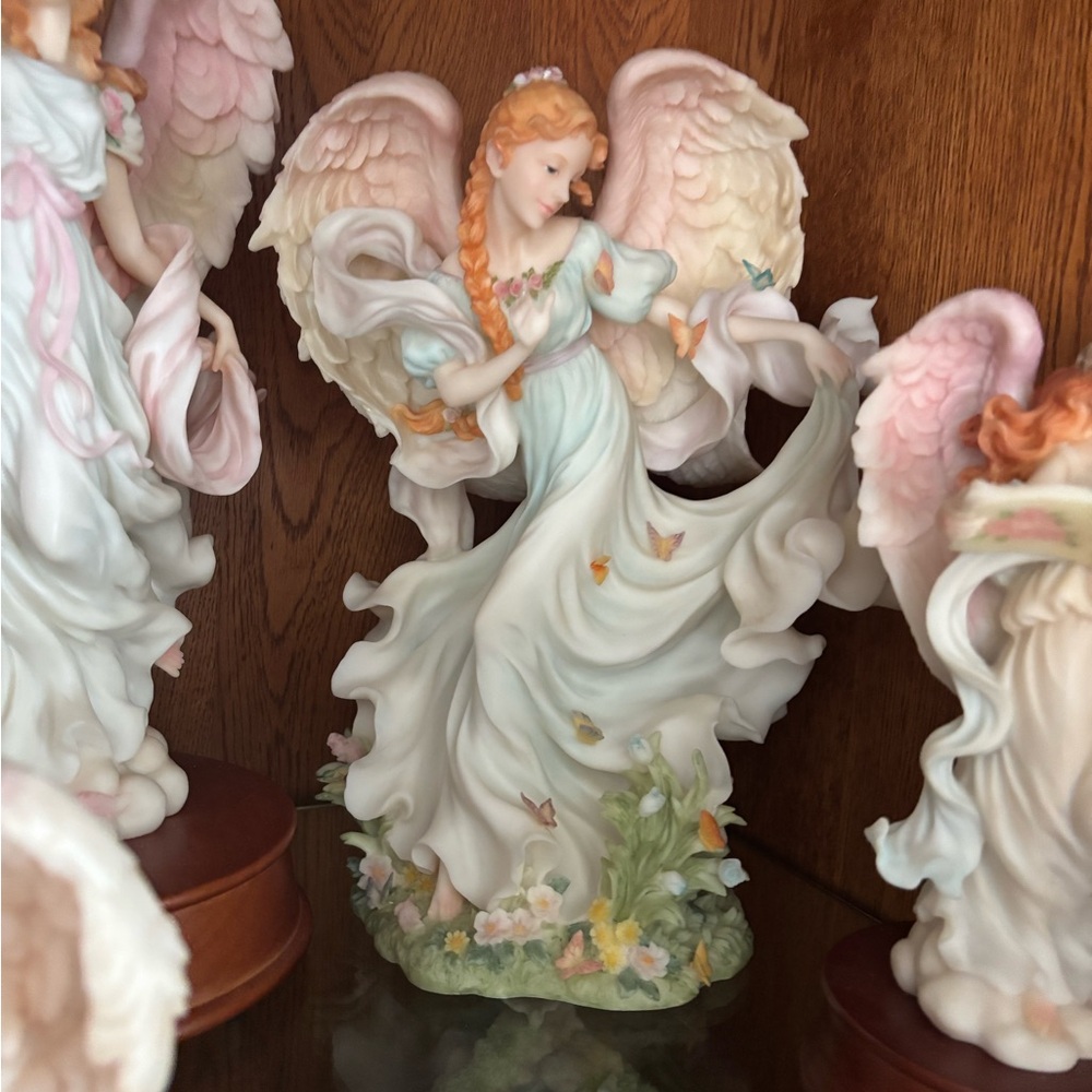 Elegant Angel Figurine with Flowing Dress